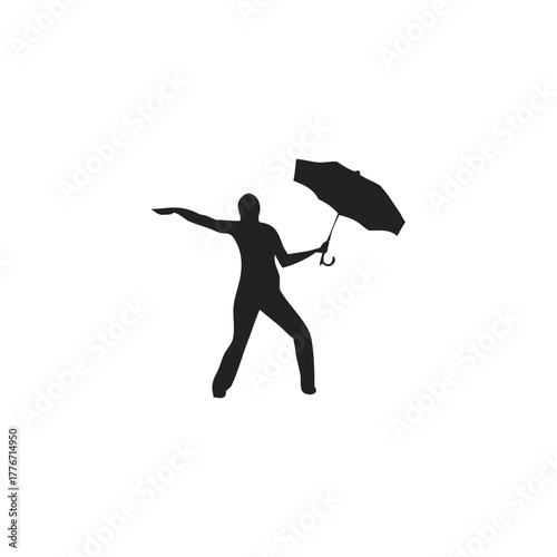 silhouette of person holding umbrella