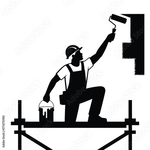 Construction worker painting a wall with a roller from scaffolding