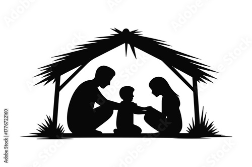 Silhouette of a holy family in a stable nativity scene