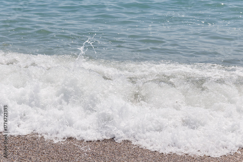 Close-up of waves splashing on shore