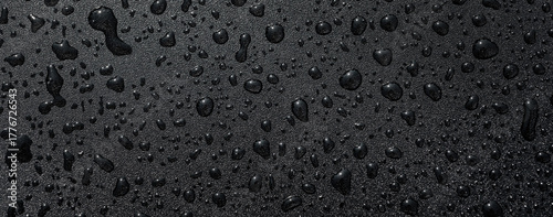 Black waterproof surface with water beading texture
