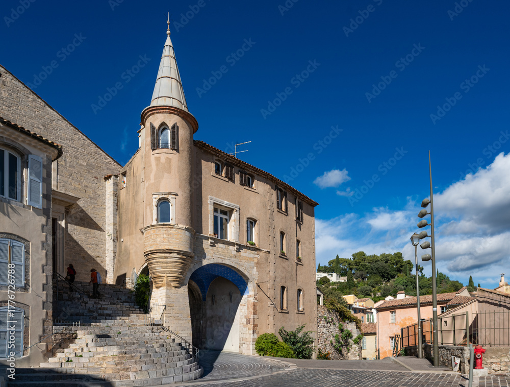 Fototapeta premium Exterior view of the Peñiscola building in Hyères, France, with its porch built in the 16th century ahead of the Saint-Paul gate