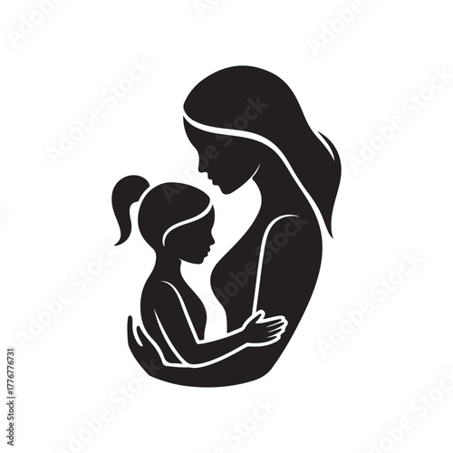 Mother lovingly cradling her child in a tender dark silhouette