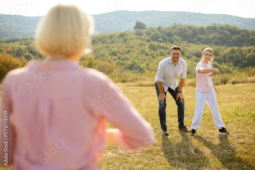 Family enjoying outdoor gam...