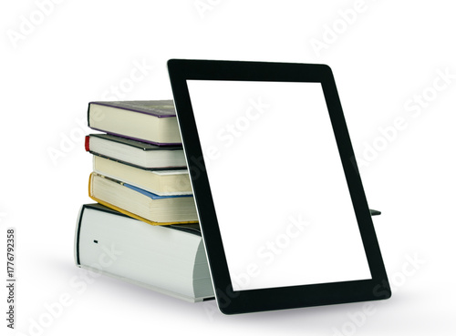 On a white background, there is a stack of five books with a black tablet with an empty screen standing on top
