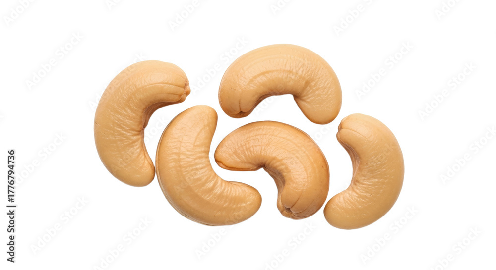 Fototapeta premium Close-up of raw cashew nuts on black background