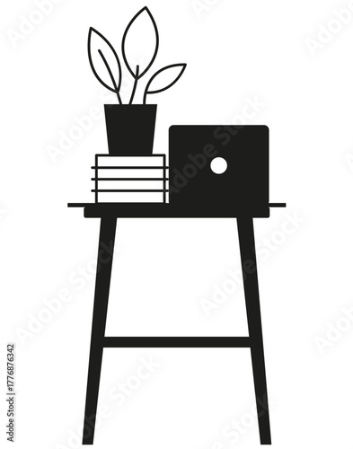 Escritorio pequeño con una lapto y plantas