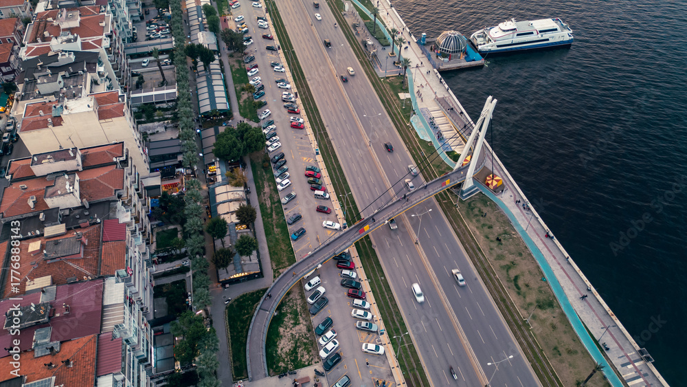 Fototapeta premium Aerial view of Göztepe coast and city traffic in İzmir Konak at dusk