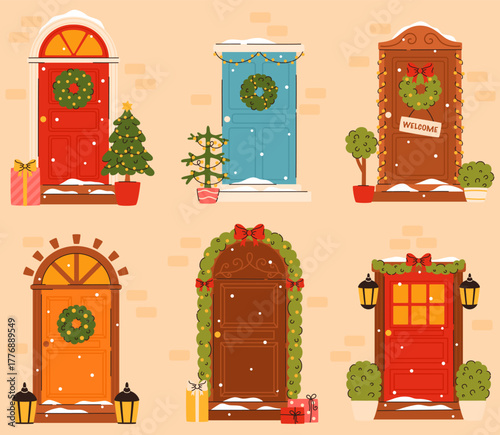 A set of doors decorated with Christmas decor.