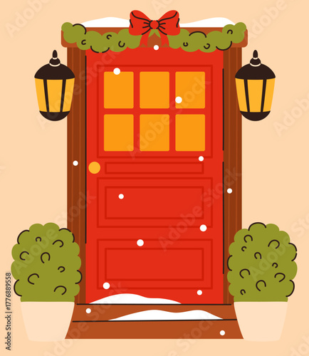 Red door decorated with Christmas garland.