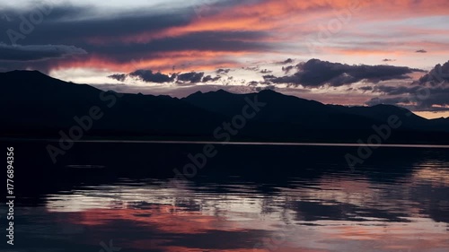 Mountain lake at sunset. Tourism and travel concept.