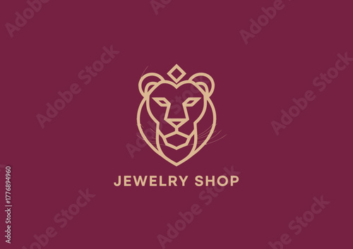 The logo embodies luxury and elegance with a lion's face, symbolizing strength and royalty, creatively designed for a modern jewelry shop branding.