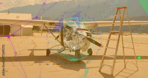 Single-engine prop plane standing on apron, with runway markings, stepladder and network overlay