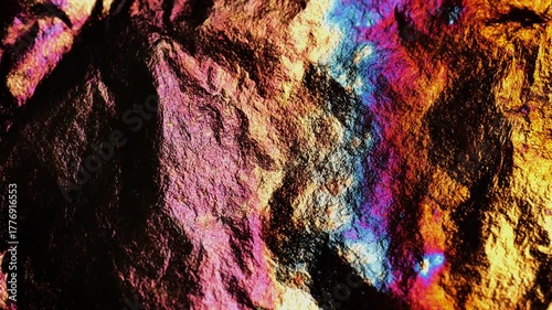 multicolored foil texture with copy space.Glittery multicolored mockup.Iridescent light on the metallic texture of foil. 4k footage