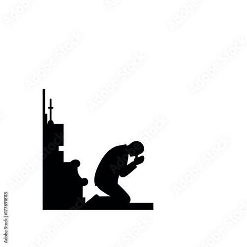 Silhouette of a man praying in church.