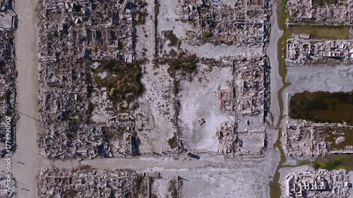 Top-down drone view of the flooded ruins and streets of Epecuén ghost town in Buenos Aires province, Argentina.