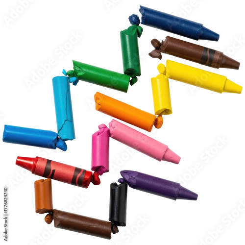 Colorful collection of broken and used wax crayons scattered for artistic projects