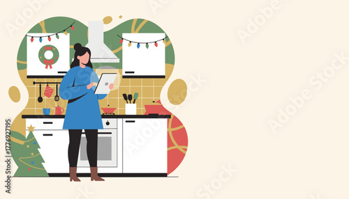 Woman using tablet for holiday cooking in a festive decorated kitchen