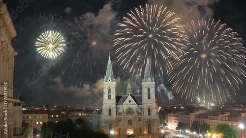 displays illuminating the night sky during a national celebration near a historic religious