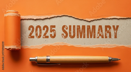 Q4 business year end review 2025 2026 new year summary with pen on torn orange paper inviting reflective planning and hopeful visual for corporate report