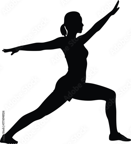 Silhouette of a Woman in Yoga Warrior Pose