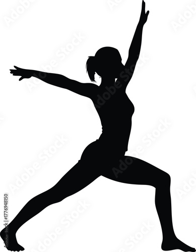 Silhouette of a Woman in Yoga Warrior Pose Stretching