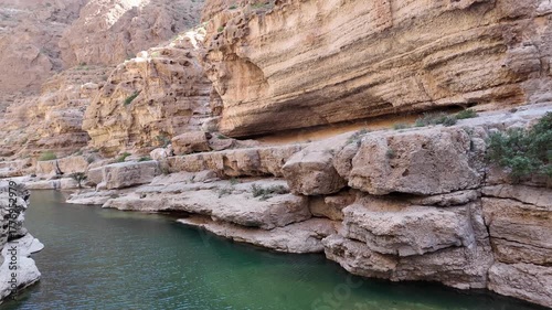 Wadi Ash Shab is a dramatic canyon in Oman famous for its hiking trail leading to emerald pools, a hidden cave, and a stunning internal waterfall.
