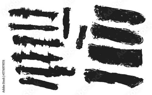 Black hand-drawn brushes vector ink splashes, paint strokes, and stains set for a grunge texture border design element
