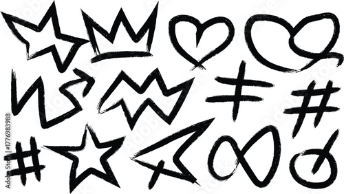 Collection of hand drawn black graffiti symbols and icons on white background