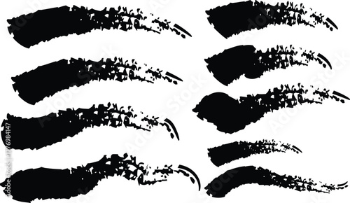 Collection of black ink brush strokes on a white background