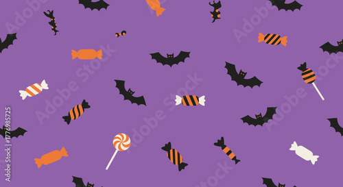 Halloween pattern with bats and candy on a purple background, festive and spooky.
