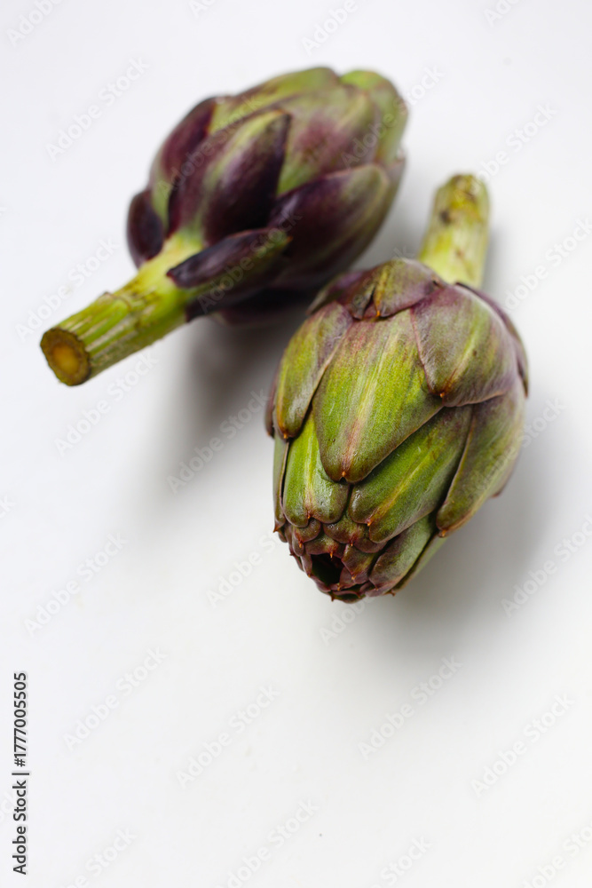 Fototapeta premium Fresh artichokes with green-purple tones