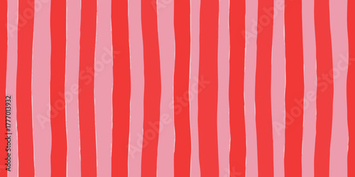 Hand drawn vertical stripes in bright red and soft pink colors abstract background