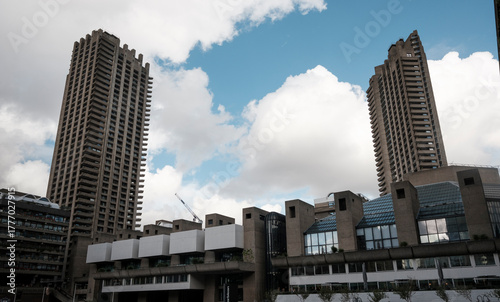 Barbican centre towers against cloudy sky london architecture
