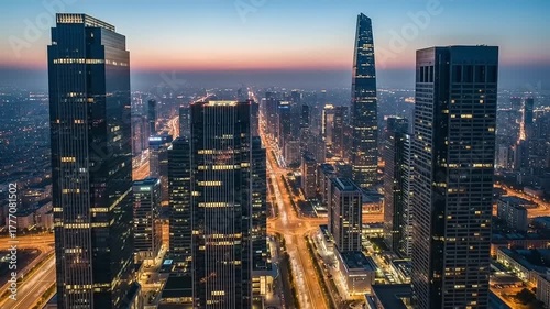 Wallpaper Mural Aerial View of Modern Cityscape at Dusk with Illuminated Skyscrapers and Busy Roads. Torontodigital.ca