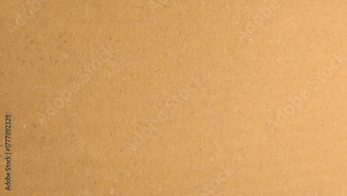 Brown background, kraft paper texture, design space. Simple plain brown background, minimal brown wallpaper paper texture. Minimal plain brown design space background.