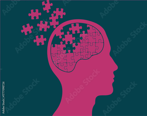 Human head silhouette with jigsaw puzzle brain symbolizing memory loss, dementia, mental health, and problem solving