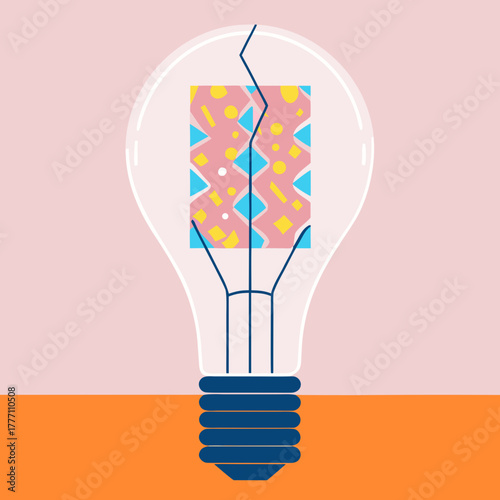 Creative lightbulb revealing colorful geometric pattern