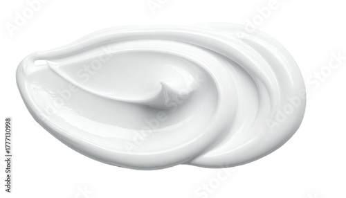 Swirl of thick, creamy, white substance on a black background