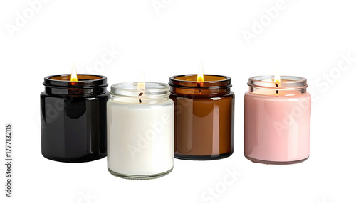 Four glowing candles in amber, white, brown, pink jars