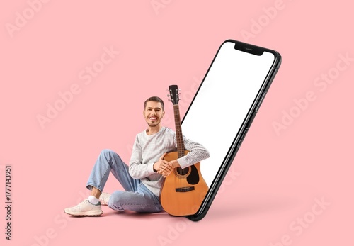 Big smartphone and young ma...