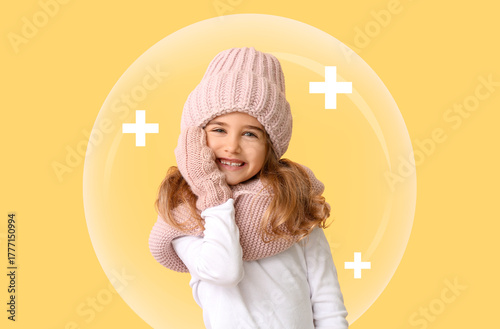 Little girl in winter cloth...