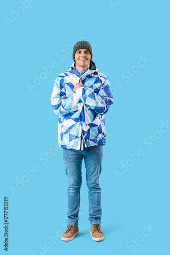 Young man in winter clothes...
