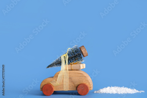Wooden toy car transporting...