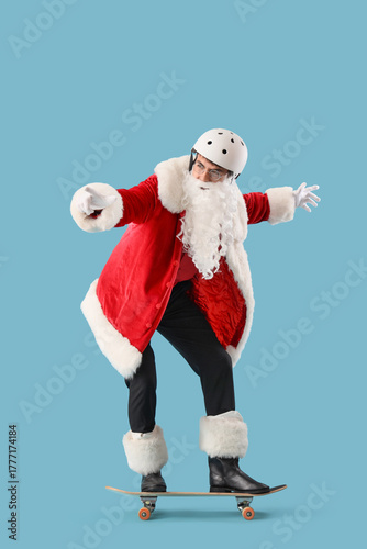 Young Santa Claus in helmet...