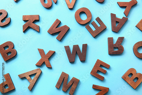 Wooden letters on blue back...