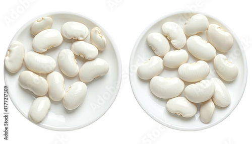 Two plates hold piles of creamy white lima beans