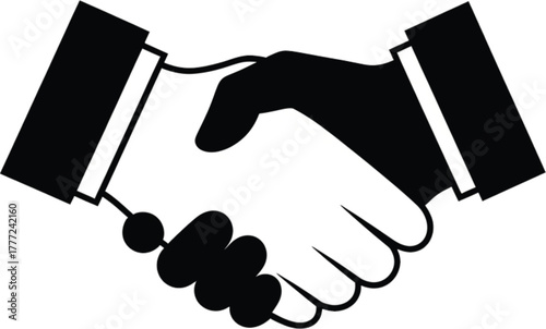Handshake Silhouette: A stark black and white depiction of a firm handshake, symbolizing agreement and collaboration. Perfect for conveying trust and partnership.