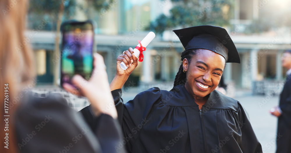 Fototapeta premium Graduation, photography and woman with smile for degree, celebration and milestone for social media. Happy, student and people with robes for ceremony, education and picture for success in university