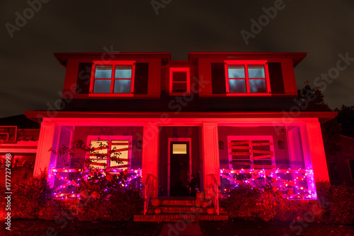 Red Halloween Haunted House Glowing in the Dark.